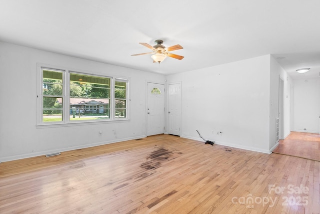 917 Sunset Ave SW, Valdese, NC 28690 - unfurnished room featuring ceiling fan and light wood-style floors