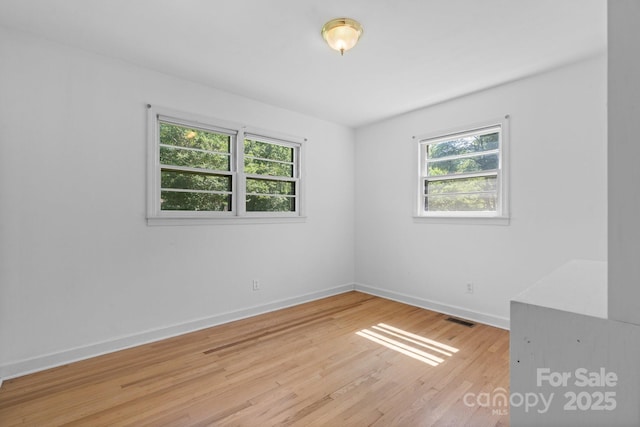 917 Sunset Ave SW, Valdese, NC 28690 - unfurnished room featuring wood finished floors and baseboards