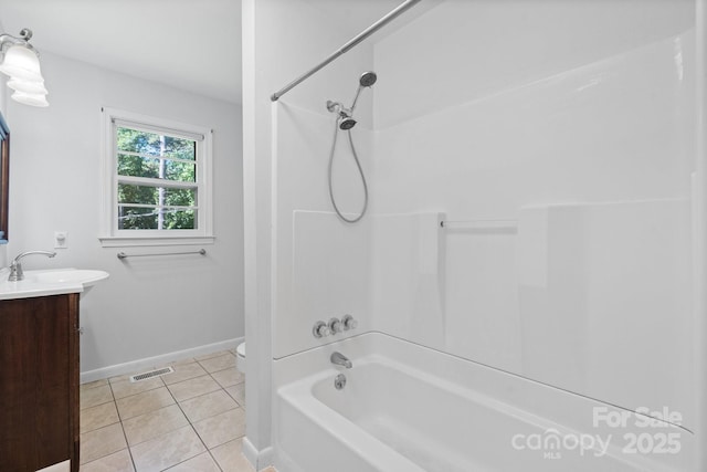 917 Sunset Ave SW, Valdese, NC 28690 - full bathroom with vanity, tile patterned flooring, and bathtub / shower combination