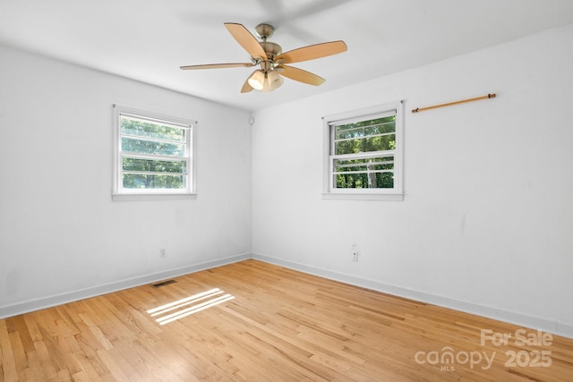 917 Sunset Ave SW, Valdese, NC 28690 - empty room with wood finished floors and ceiling fan