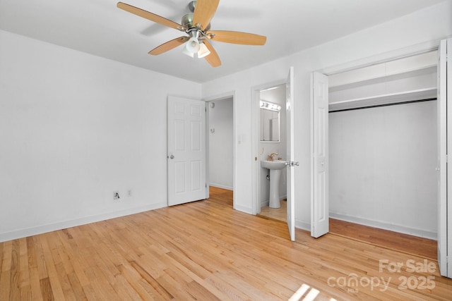 917 Sunset Ave SW, Valdese, NC 28690 - unfurnished bedroom with light wood finished floors and a ceiling fan
