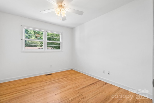 917 Sunset Ave SW, Valdese, NC 28690 - unfurnished room featuring light wood-type flooring and a ceiling fan
