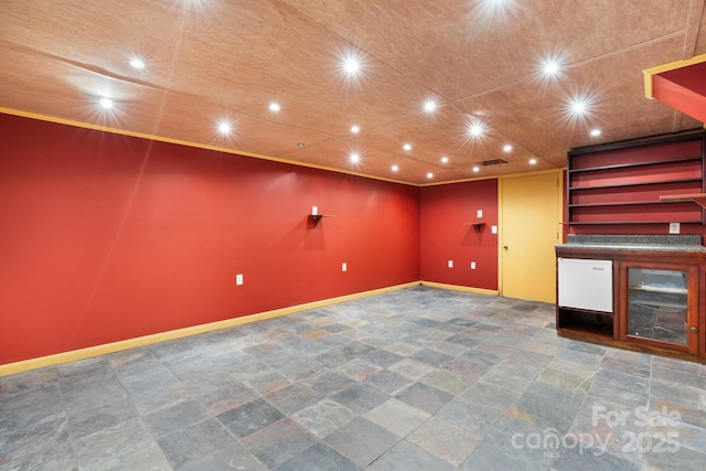 917 Sunset Ave SW, Valdese, NC 28690 - basement with stone finish floors, bar, and recessed lighting