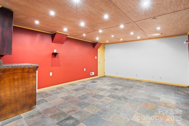 917 Sunset Ave SW, Valdese, NC 28690 - below grade area featuring stone finish flooring, crown molding, and recessed lighting