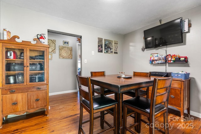 4006 Sol Mull St, Morganton, NC 28655 - dining space with wood-type flooring and baseboards