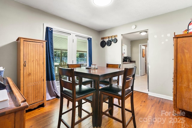 4006 Sol Mull St, Morganton, NC 28655 - dining room with light wood-style floors and french doors
