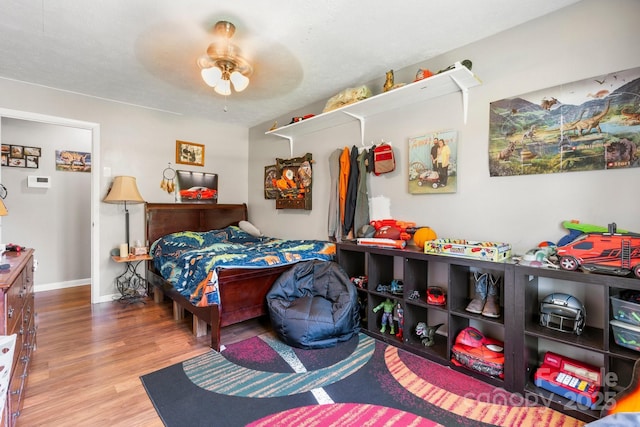4006 Sol Mull St, Morganton, NC 28655 - bedroom with wood finished floors and a ceiling fan
