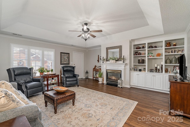 1610 Union Rd Unit 1610B, Gastonia, NC 28054 - living area featuring a raised ceiling, a ceiling fan, dark wood-style floors, and ornamental molding