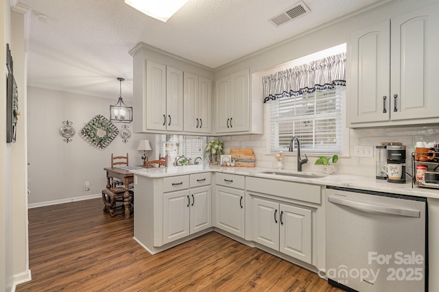 1610 Union Rd Unit 1610B, Gastonia, NC 28054 - kitchen featuring dishwasher, crown molding, wood finished floors, light countertops, and tasteful backsplash