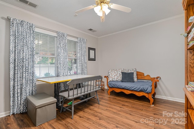 1610 Union Rd Unit 1610B, Gastonia, NC 28054 - living area with crown molding, wood finished floors, and a ceiling fan