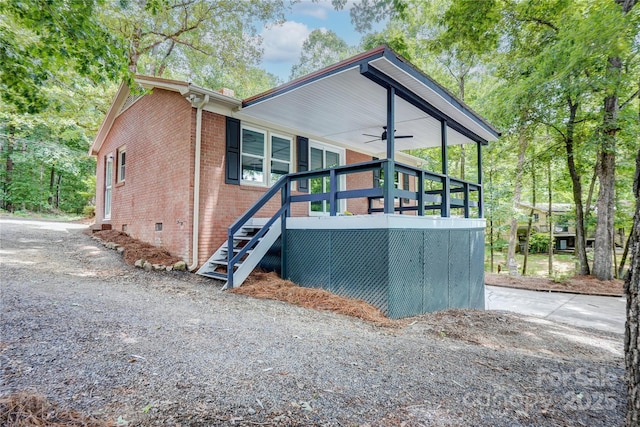 9763 Pine Tree Rd, Norwood, NC 28128 - view of front of property featuring brick siding, ceiling fan, and stairs