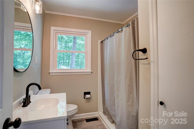 9763 Pine Tree Rd, Norwood, NC 28128 - full bathroom featuring vanity, crown molding, a shower with curtain, and wood finished floors