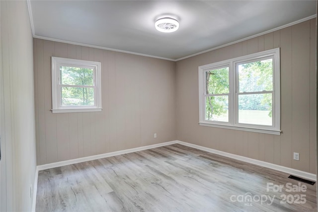 9763 Pine Tree Rd, Norwood, NC 28128 - unfurnished room featuring wood finished floors and ornamental molding