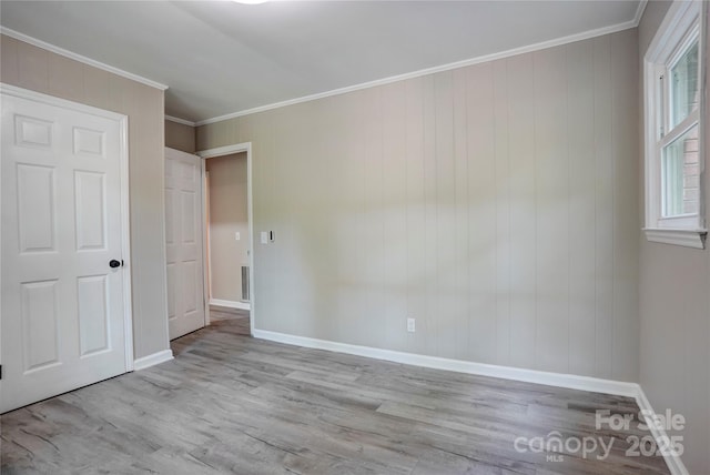 9763 Pine Tree Rd, Norwood, NC 28128 - unfurnished bedroom with wood finished floors and ornamental molding