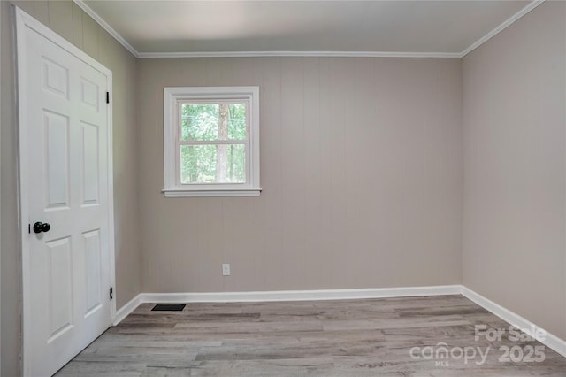 9763 Pine Tree Rd, Norwood, NC 28128 - unfurnished bedroom featuring wood finished floors and ornamental molding