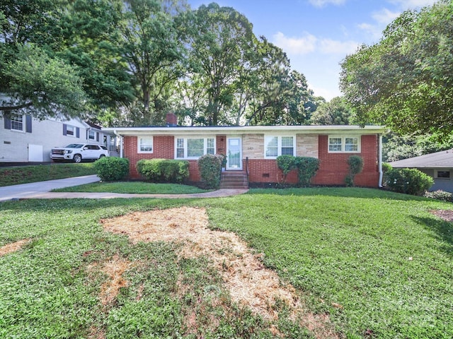 6401 Montpelier Rd, Charlotte, NC 28210 - single story home featuring a front yard, a chimney, and brick siding