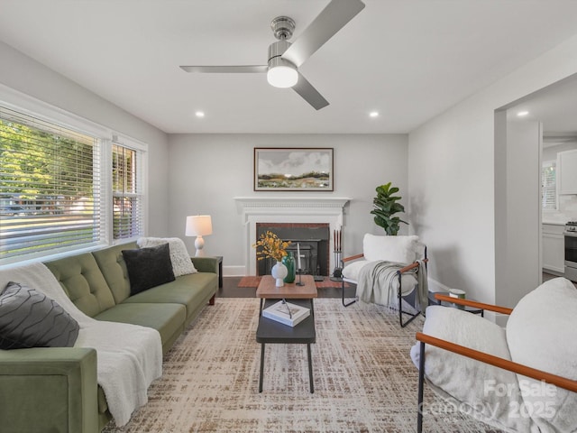 6401 Montpelier Rd, Charlotte, NC 28210 - living area featuring plenty of natural light, recessed lighting, ceiling fan, a fireplace with flush hearth, and wood finished floors
