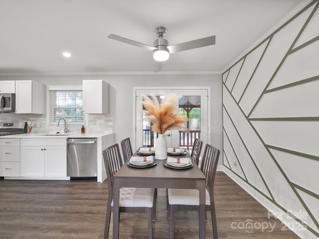 6401 Montpelier Rd, Charlotte, NC 28210 - dining room featuring crown molding, dark wood-style flooring, a ceiling fan, and recessed lighting