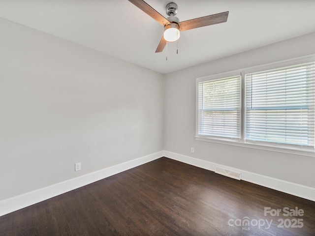 6401 Montpelier Rd, Charlotte, NC 28210 - empty room featuring dark wood-style floors and a ceiling fan