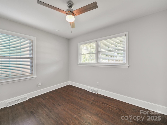 6401 Montpelier Rd, Charlotte, NC 28210 - empty room featuring dark wood-style floors and ceiling fan