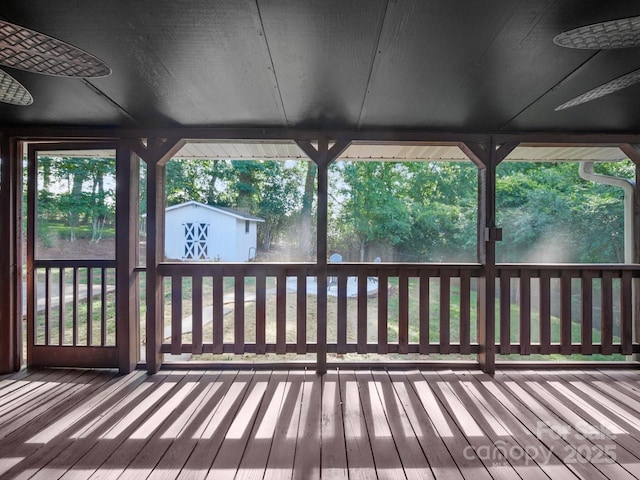 6401 Montpelier Rd, Charlotte, NC 28210 - wooden deck featuring a storage unit