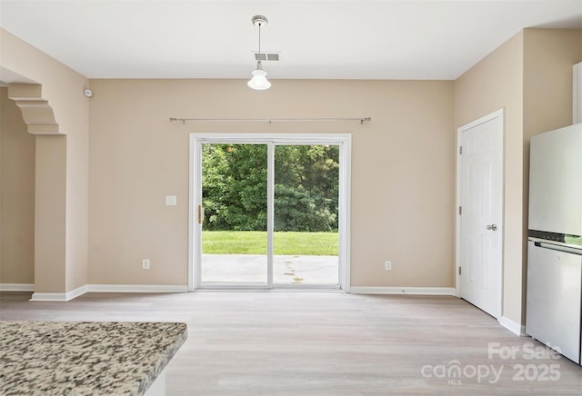 3043 Streamlet Way, Monroe, NC 28110 - unfurnished dining area with light wood-style floors