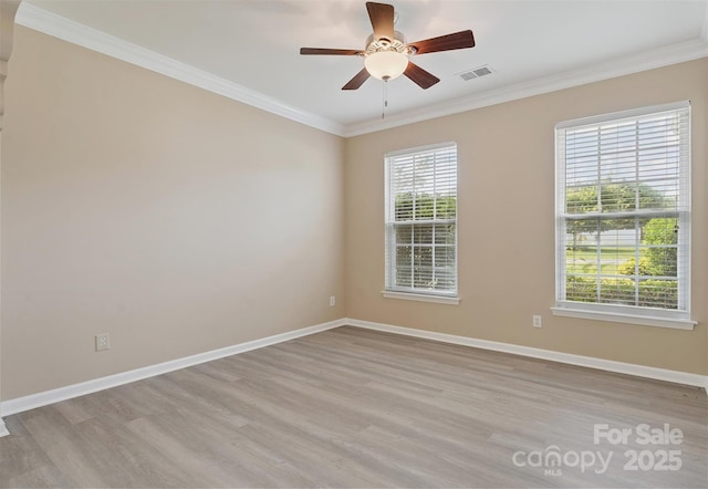 3043 Streamlet Way, Monroe, NC 28110 - spare room with light wood-style floors, ornamental molding, and a ceiling fan