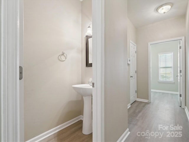 3043 Streamlet Way, Monroe, NC 28110 - bathroom with wood finished floors and baseboards