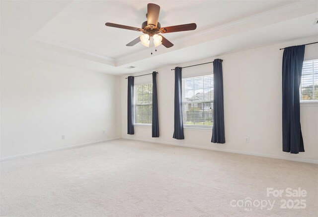 3043 Streamlet Way, Monroe, NC 28110 - carpeted empty room featuring crown molding, ceiling fan, and a raised ceiling