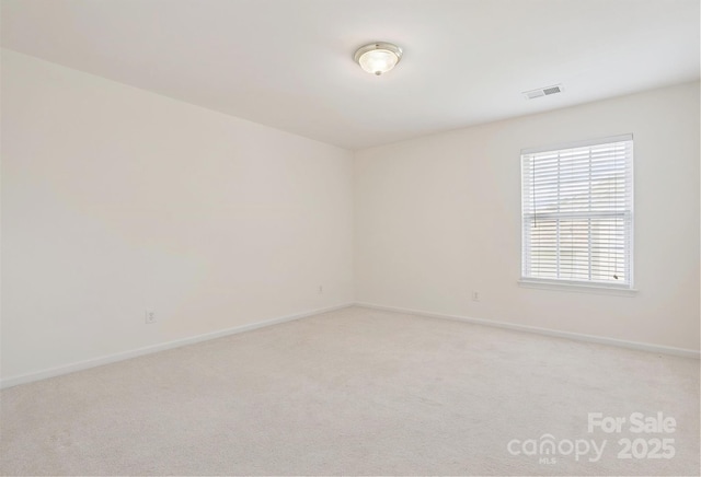 3043 Streamlet Way, Monroe, NC 28110 - empty room featuring baseboards and light colored carpet