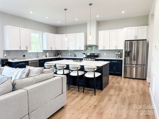 154 Amblers Knoll Rd, Weaverville, NC 28787 - kitchen with stainless steel appliances, open floor plan, light countertops, and recessed lighting