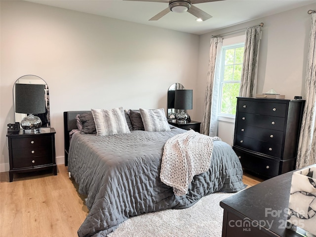 154 Amblers Knoll Rd, Weaverville, NC 28787 - bedroom featuring light wood-type flooring and ceiling fan