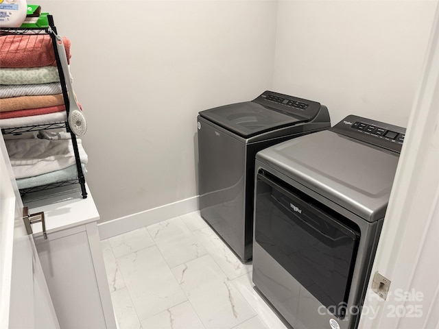 154 Amblers Knoll Rd, Weaverville, NC 28787 - washroom featuring washing machine and clothes dryer and light marble finish flooring