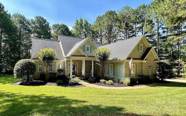 347 Bayberry Creek Cir, Mooresville, NC 28117 - view of front of home with a front lawn, covered porch, and brick siding