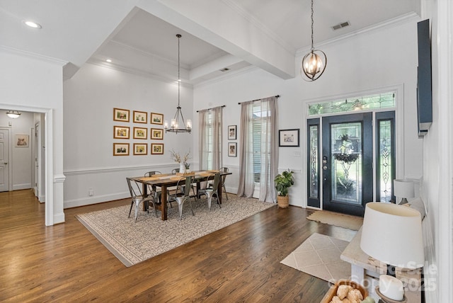 347 Bayberry Creek Cir, Mooresville, NC 28117 - dining area with a chandelier, wood finished floors, and crown molding