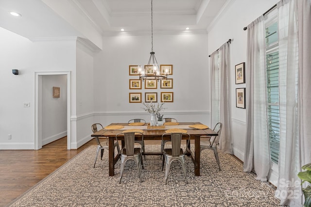 347 Bayberry Creek Cir, Mooresville, NC 28117 - dining area with wood finished floors, a chandelier, ornamental molding, recessed lighting, and a raised ceiling