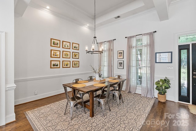 347 Bayberry Creek Cir, Mooresville, NC 28117 - dining space featuring dark wood-type flooring, a chandelier, and crown molding
