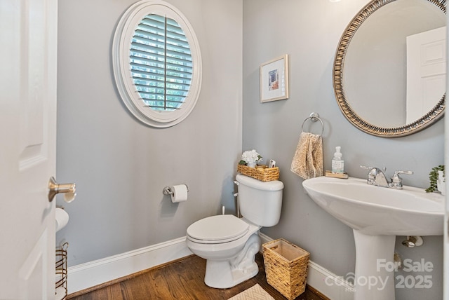 347 Bayberry Creek Cir, Mooresville, NC 28117 - bathroom with baseboards and wood finished floors