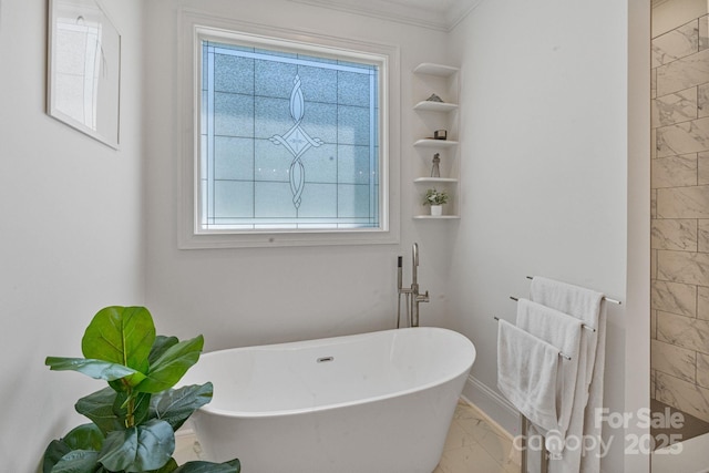 347 Bayberry Creek Cir, Mooresville, NC 28117 - bathroom featuring marble look tile flooring, a soaking tub, healthy amount of natural light, and crown molding