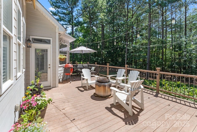 347 Bayberry Creek Cir, Mooresville, NC 28117 - wooden deck featuring a fire pit