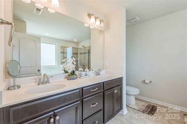 1012 Leland Dr, Wesley Chapel, NC 28104 - full bath featuring double vanity, a shower stall, and tile patterned floors