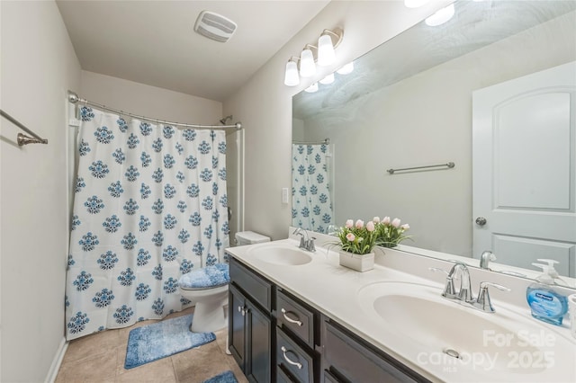 1012 Leland Dr, Wesley Chapel, NC 28104 - full bath with double vanity, tile patterned flooring, and a shower with shower curtain