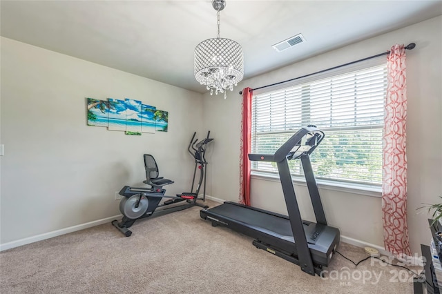 1012 Leland Dr, Wesley Chapel, NC 28104 - exercise area with a chandelier and carpet