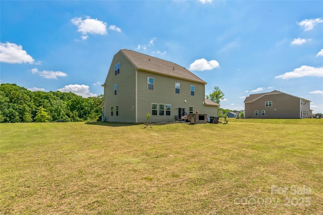 1012 Leland Dr, Wesley Chapel, NC 28104 - back of house featuring a lawn