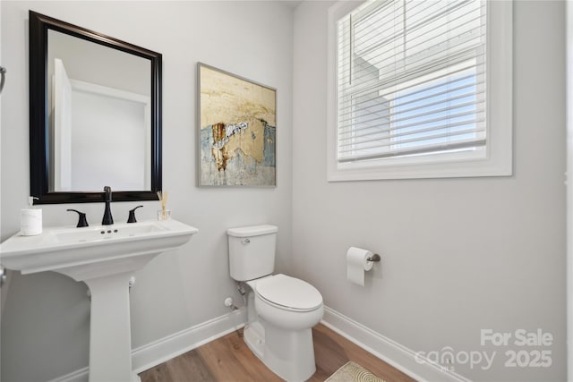 416 Balboa St, Matthews, NC 28104 - bathroom with baseboards and wood finished floors