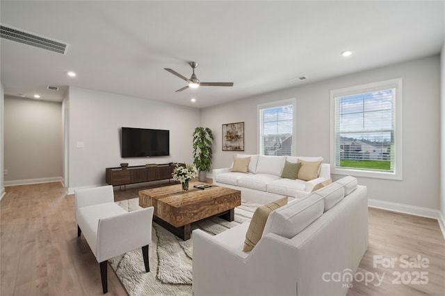 416 Balboa St, Matthews, NC 28104 - living room with light wood-style floors, ceiling fan, and recessed lighting