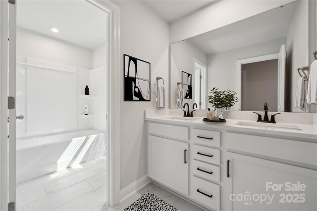 416 Balboa St, Matthews, NC 28104 - full bathroom with marble finish floors and double vanity