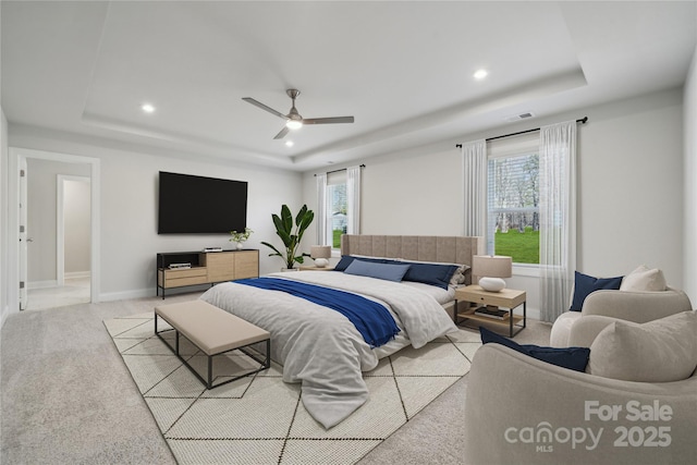 416 Balboa St, Matthews, NC 28104 - carpeted bedroom featuring a raised ceiling, multiple windows, recessed lighting, and ceiling fan