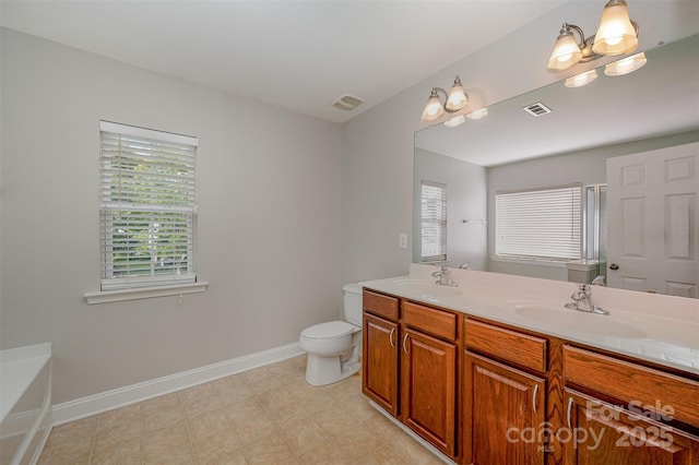 124 Glade Valley Ave, Mooresville, NC 28117 - full bath featuring double vanity, plenty of natural light, a garden tub, and an enclosed shower