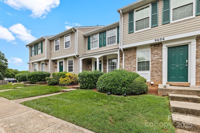9606 Vinca Cir Unit E, Charlotte, NC 28213 - multi unit property with a front lawn